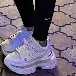 Naked Wolfe brand, new shoes